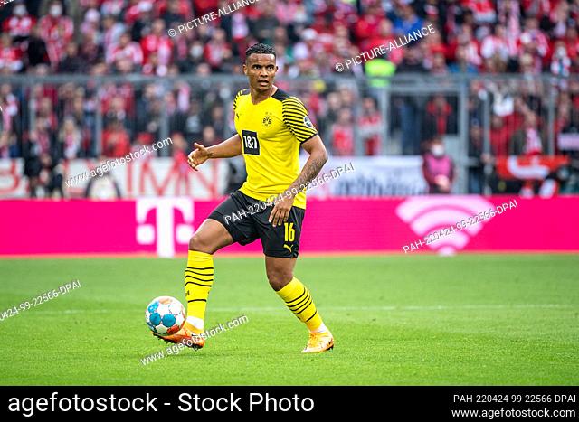 23 April 2022, Bavaria, Munich: Soccer: Bundesliga, Bayern Munich - Borussia Dortmund, Matchday 31, Allianz Arena. Manuel Akanji from Borussia Dortmund plays...