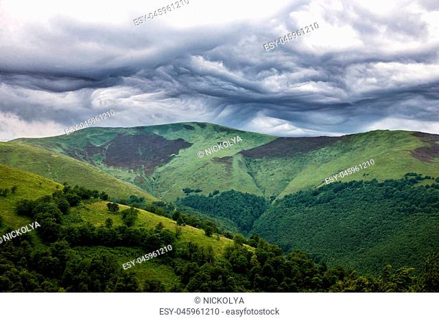 Amazing carpathian mountains and dramatic sky. Ukraine