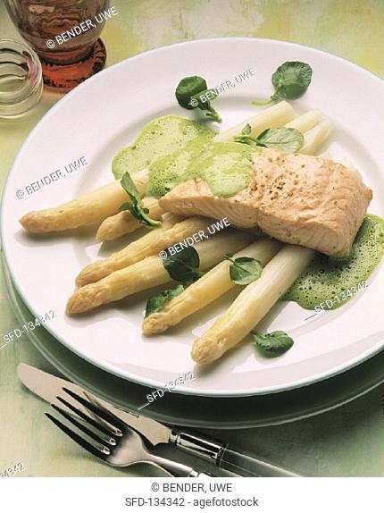 Salmon fillet on white asparagus with cress whip