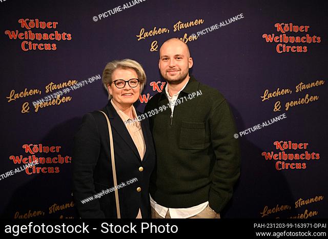 02 December 2023, North Rhine-Westphalia, Cologne: Actress Andrea Spatzek and her son Alexander attend the premiere of the 8th Cologne Christmas Circus Photo:...