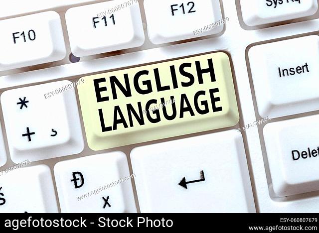 Hand writing sign English Language, Concept meaning third spoken native lang in world after Chinese and Spanish Retyping Old Worksheet Data