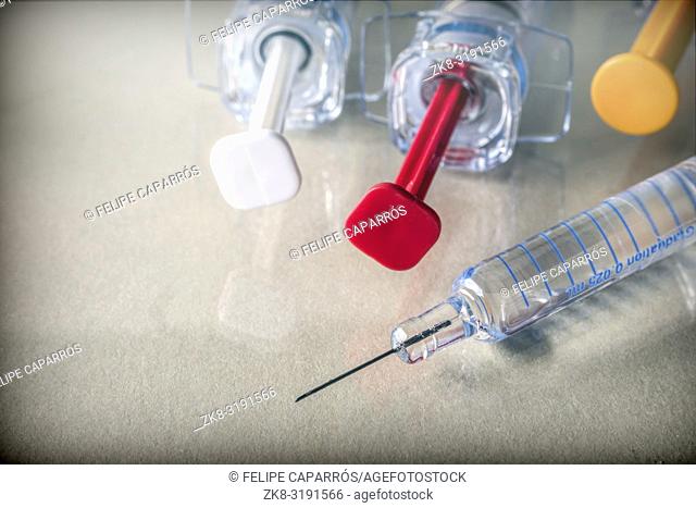 Some syringes of different size, conceptual image medicine