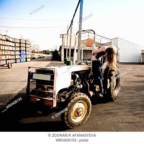 Woman On A Tractor