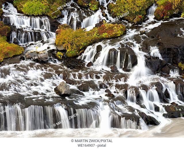 Waterfall Hraunfossar with colorful foilage during fall. europe, northern europe, iceland, september