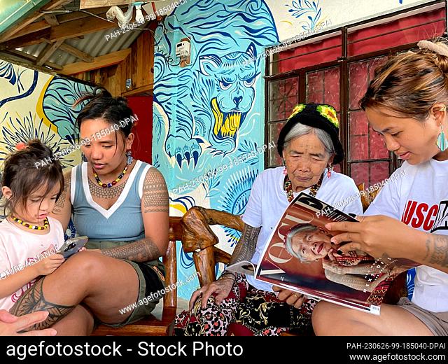 PRODUCTION - 24 May 2023, Philippines, Buscalan: Maria Oggay (2nd from right), known as Apo Whang-Od, the oldest mambabatok or traditional tattoo artist in the...