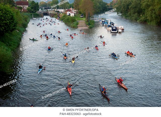 Rowers take part in the 44th Wesermarathon in Hann. Muenden, Germany, 04 May 2014. The race course follows the Weser River for 135 kilometers to Hameln