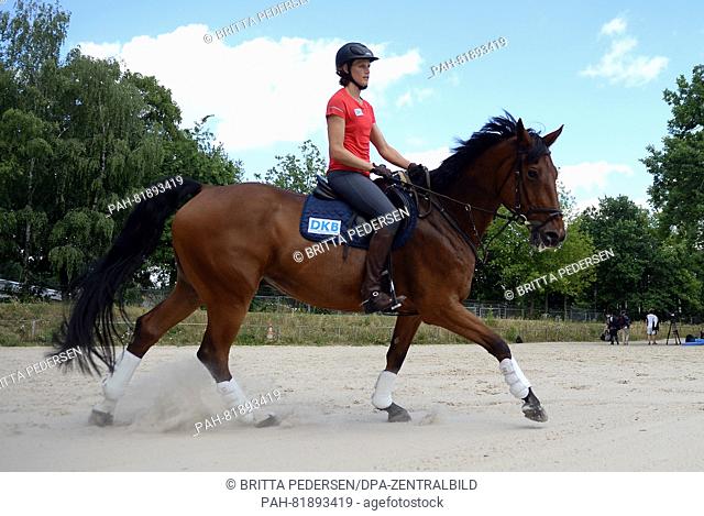 Modern pentathlete Lena Schoeneborn and her horse 'Cashew' in action during a media day for the Olympic Games 2016 in Rio de Janeiro