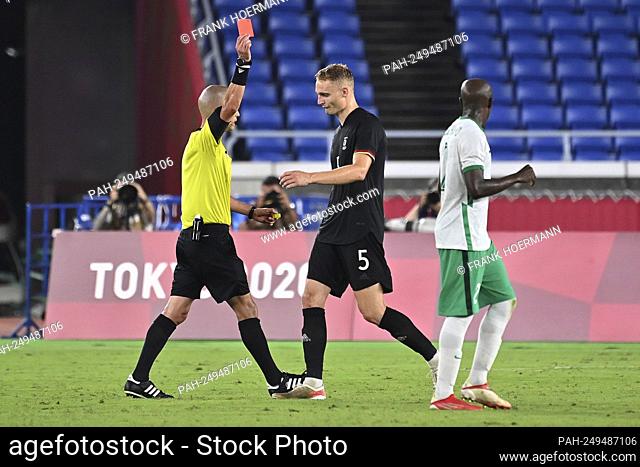 referee Victor GOMES (RSA) shows Amos PIEPER (GER) the yellow red card. Saudi Arabia (KSA) - Germany (GER) 2-3, football