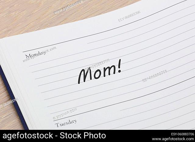 A Mom reminder note in a diary page