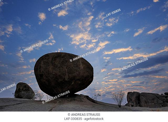 Balancing granite rock laying on slab, Bull's Party, Ameib, Erongo mountains, Namibia