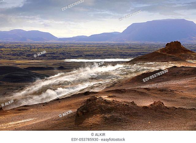 Amazing view of steaming sulfur fumaroles in Hverir Namafjall geothermal place in Iceland