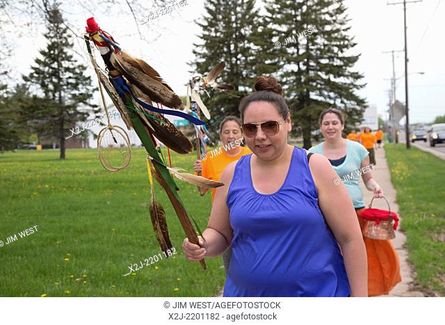 Ashland, Wisconsin - Members of the Bad River Band of the Lake Superior Chippewa Tribe marched 42 miles around the Bad River watershed to show their opposition...