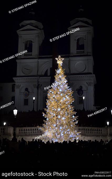 Dior lights up the Spain Square in Rome for Christmas. A large tree, over 15 meters high, decorated with the ""Christian Dior around the world"" ribbon and...