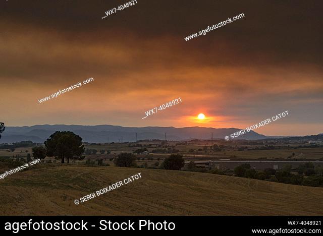 Sunset at the wildfire of El Pont de Vilomara, on July 17, 2022, which burned 1, 743 hectares of vegetation (Bages, Barcelona, Catalonia, Spain)