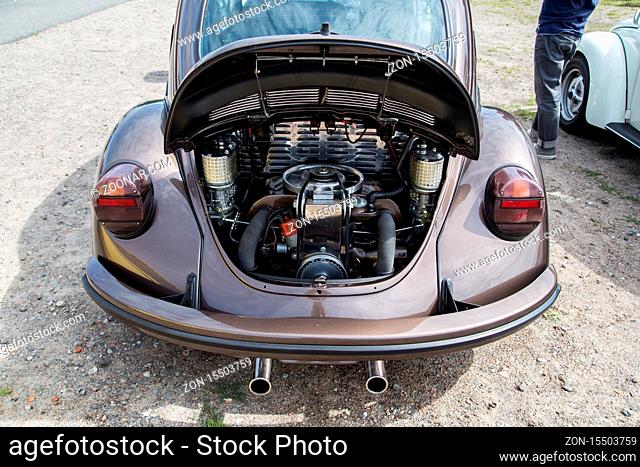 Celle, Germany - August 7, 2016: Engine inside the rear trunk of a Volkswagen Beetle at the annual Kaefer Meeting
