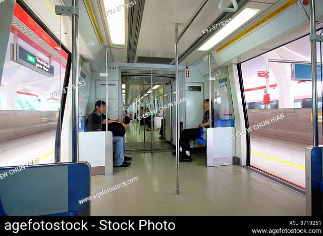 Passengers travelling in the MRT subway in Singapore