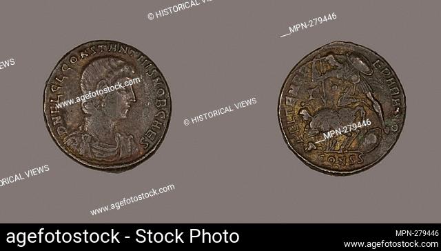 Author: Ancient Roman. Coin Portraying Emperor Constantine II or Emperor Constantius Gallus - AD 317/337 or (Constantine II) AD 351/354 (Constanius Gallus) -...