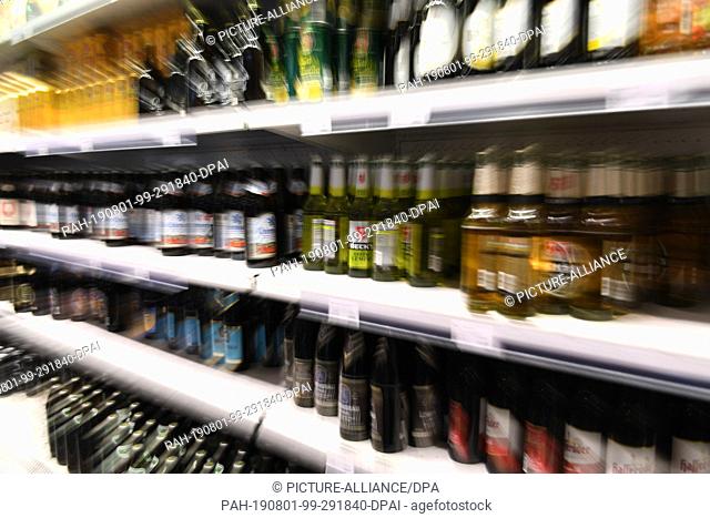 31 July 2019, Bavaria, Munich: Zoom effect: Beverages are placed in a refrigerated shelf in the catering area in the main hall of the HBF