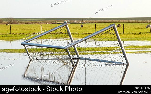 Football goal in a flooded field in Holland