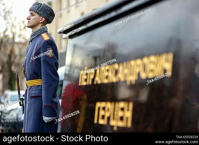 RUSSIA, MOSCOW - DECEMBER 20, 2023: A serviceman is seen by a monument to Russian surgeon Pyotr Gertsen unveiled as part of celebrations of the 125th...