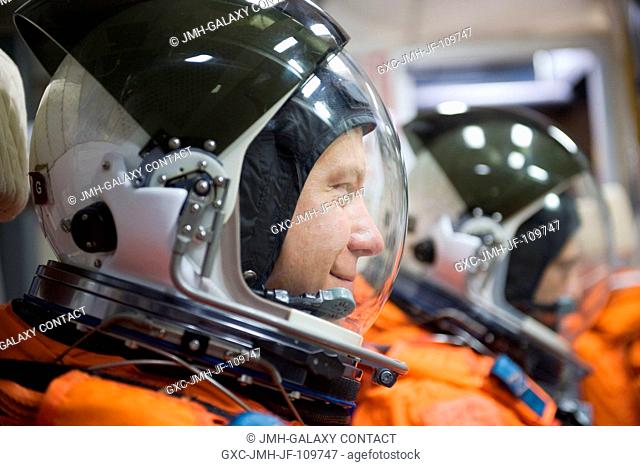 Astronaut Tim Kopra, STS-127 mission specialist, attired in a training version of his shuttle launch and entry suit, is pictured during a training session in...