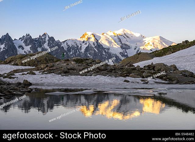 Morning atmosphere at sunrise, water reflection in Lac Blanc, mountain top, Aiguille Verte, Grandes Jorasses, Aiguille du Moine, Mont Blanc, Mont Blanc massif