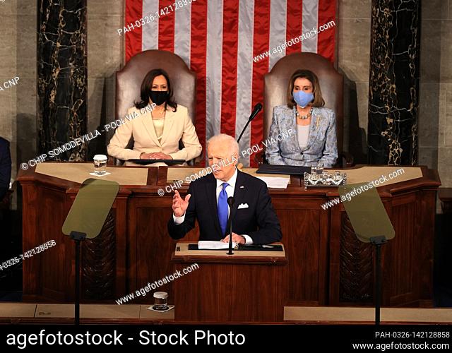 WASHINGTON, DC - APRIL 28: U.S. President Joe Biden addresses a joint session of congress as Vice President Kamala Harris (L) and Speaker of the House U