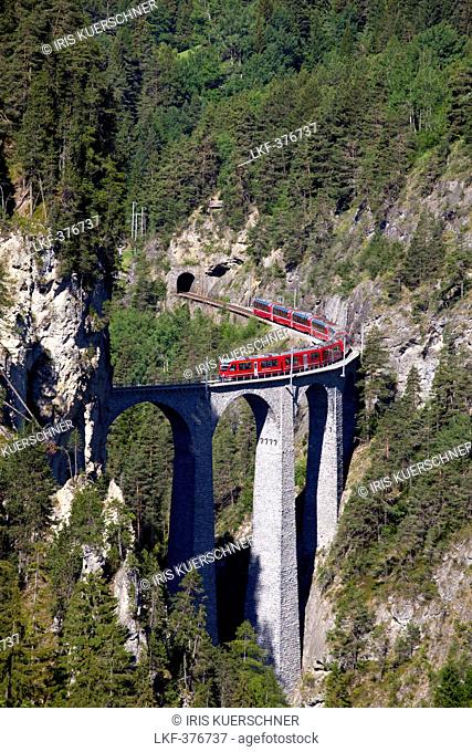 Glacier Express, crossing the Landwasser Viaduct near Filisur, Graubuenden, Switzerland