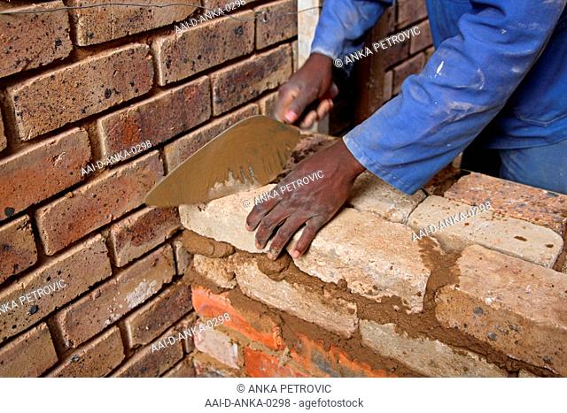 Brick layer laying bricks, Moreleta Park, Pretoria, Gauteng Province, South Africa