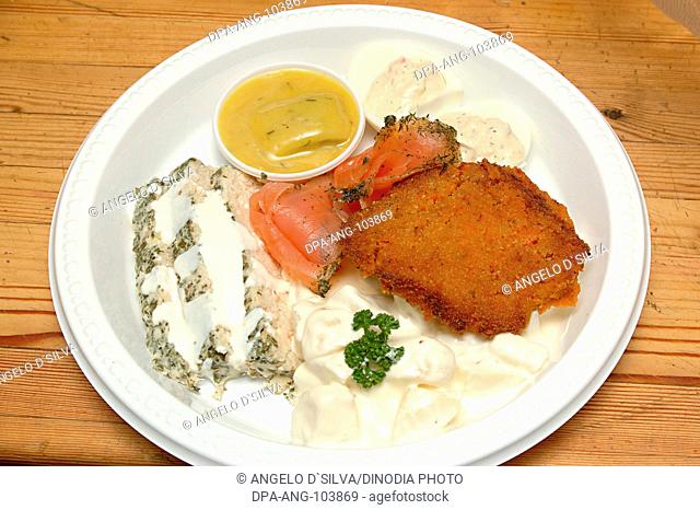 Food , Christmas plate with Herring (Snap (Mustered) Sill fish) , Gravad Lax (Smoked Salmon Fish with Dill) , Boiled eggs with cold Crab Fish Sauce