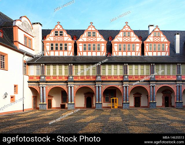 Europe, Germany, Hesse, Limburg-Weilburg county, Weilburg town, Lahn valley, Weilburg castle, castle courtyard, view of north wing with dwarf houses and oriel...