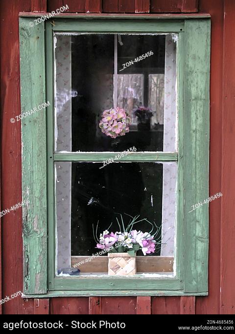 Old window of wooden house