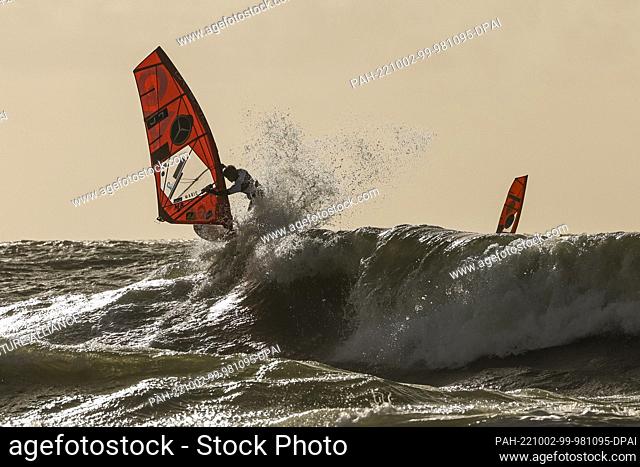 02 October 2022, Schleswig-Holstein, Westerland/Sylt: Takuma Sugi (Japan) surfs a wave during a competition in the Wave discipline