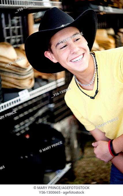 Teenage Boy Smiling Wearing a Cowboy Hat at Dixie Classic Fair, Winston Salem, NC