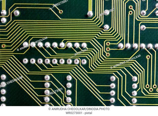 Green electronic printed circuit board PCB yellow tracks