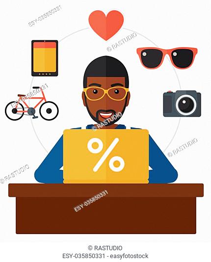 An african-american man sitting in front of laptop with some icons of goods around him vector flat design illustration isolated on white background