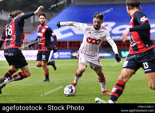 RFC Liege's Benoit Nyssen and Standard's Maxime Lestienne fight for the ball during a friendly soccer game between Standard de Liege and RFC Liege