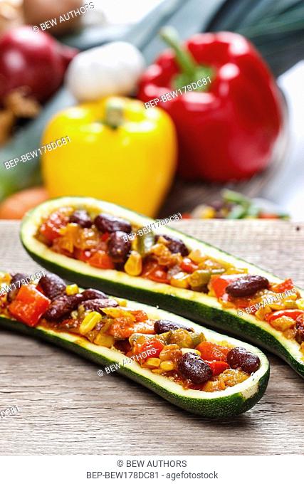Zucchini stuffed with vegetable salad