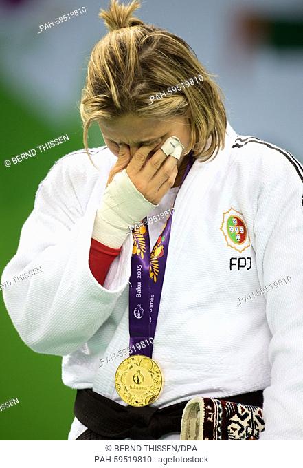 Portugal winner Telma Monteiro cries during the medal ceremony for winning bronze in the Women's -57kg Judo at the Baku 2015 European Games in Heydar Aliyev...