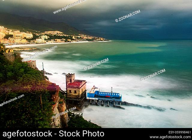 Waves and coastal storm on the fishing village of Boccadasse in Genoa, Liguria