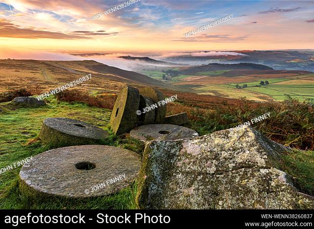 Can you spot the stoat peeking out of the mill stone? A stunning morning around Stanage Edge with mist and fog at sunrise with the famous mill stones in the...