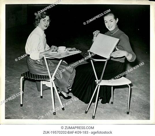 Feb. 02, 1957 - Chair is Able to become Table: Shown at a recent furniture exhibit in London was a tubular steel chair that can be opened out to become a table