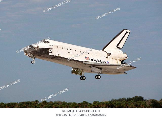 Space Shuttle Atlantis approaches landing on runway 15 of the Shuttle Landing Facility at NASA's Kennedy Space Center, concluding the 13-day STS-122 mission