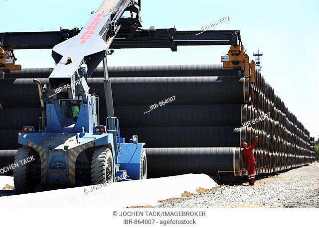 Delivery of steel pipes at the temporary storage facility for the Baltic Sea pipeline, which will transport gas from the Russian town Wyborg to Greifswald
