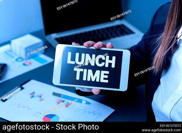 Hand writing sign Lunch Time, Business showcase Meal in the middle of the day after breakfast and before dinner Businesswoman Holding Phone With Important...