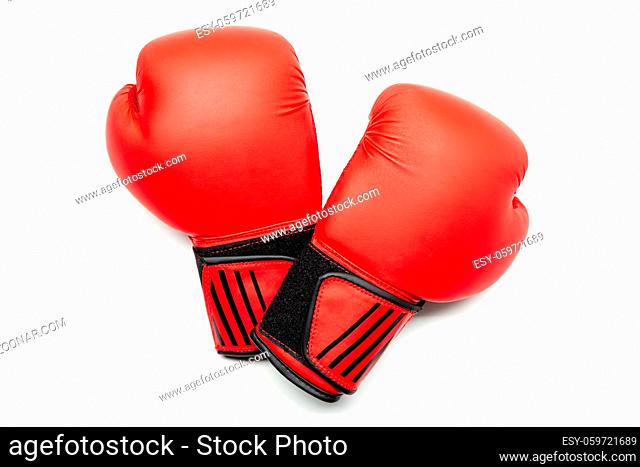 Pair of red boxing gloves isolated on white background. Fighting concept. Mock up