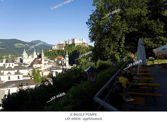 View from terrace of the restaurant Stadtalm over old town with Hohensalzburg Fortress, largest, fully-preserved fortress in central Europe, Salzburg Cathedral