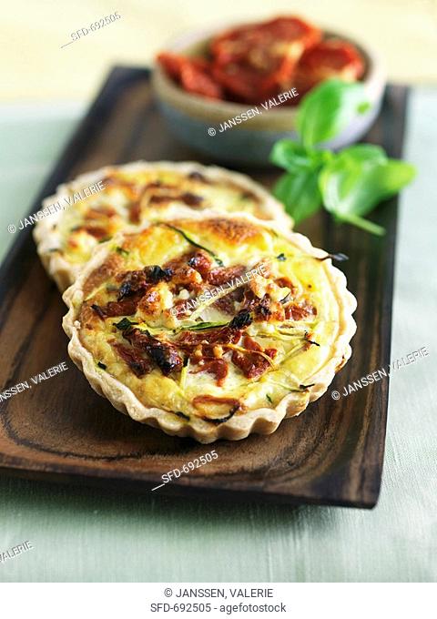 Sun Dried Tomato Quiches on Wooden Tray