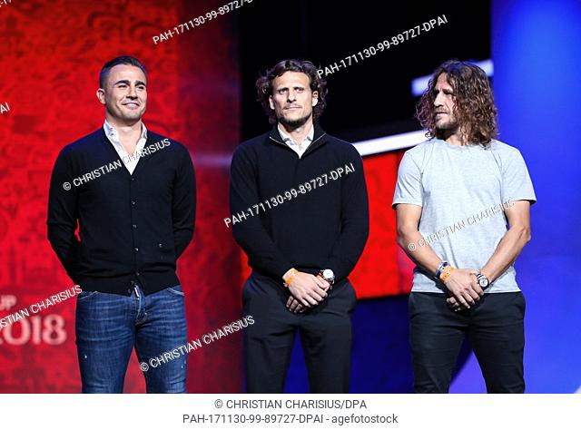 (l-r) Fabio Cannavaro, Diego ForlÃ¡n and Carles Puyol stand on the stage for the World Cup drawing during a photo call after the dress rehearsal at the Kreml...