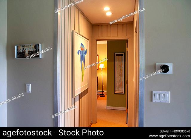 Illuminated Bedroom Floor Lamp viewed through Small Hallway